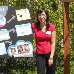 Me with our design poster and the turbine.